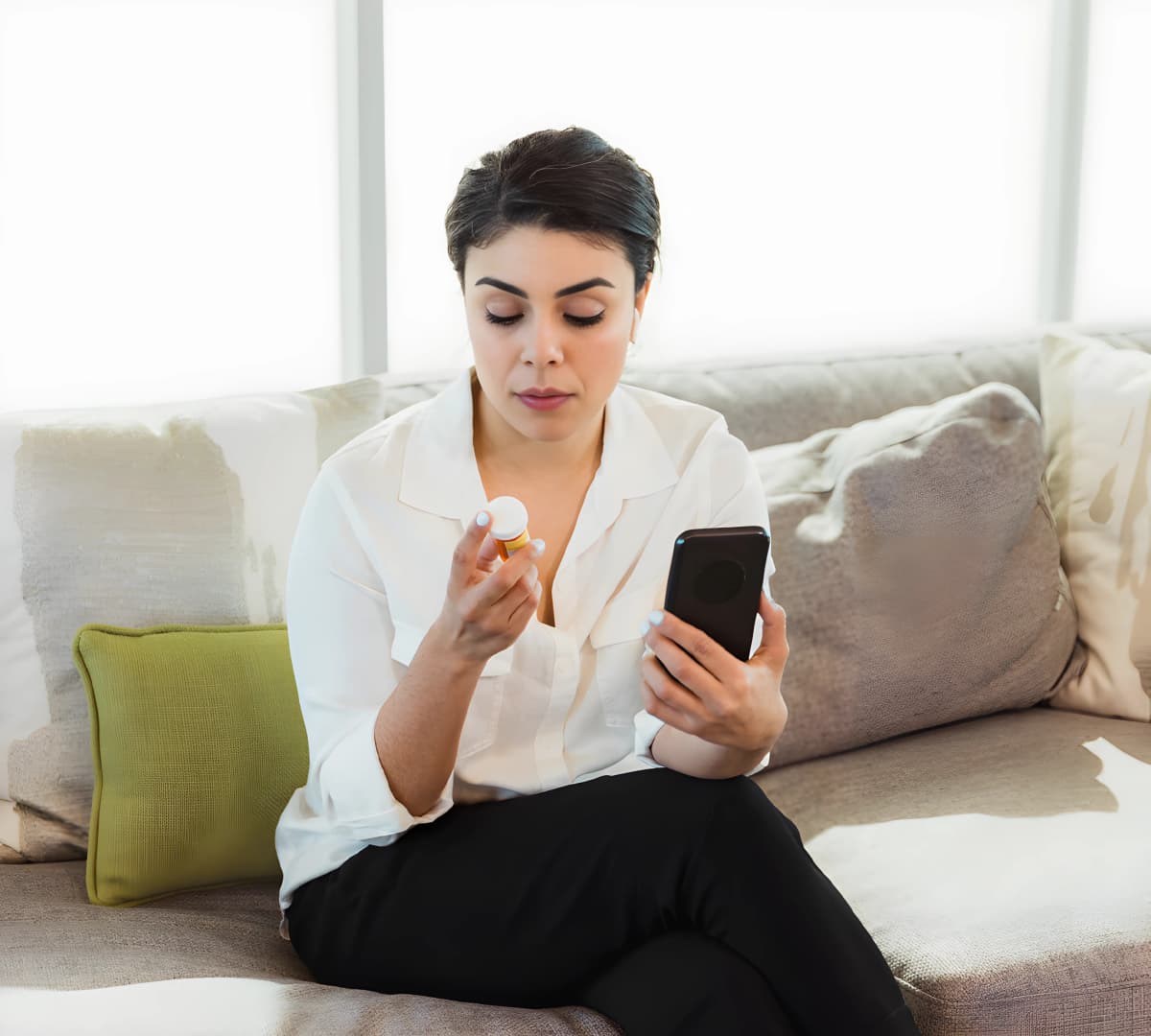 Pharmacist answering customer questions